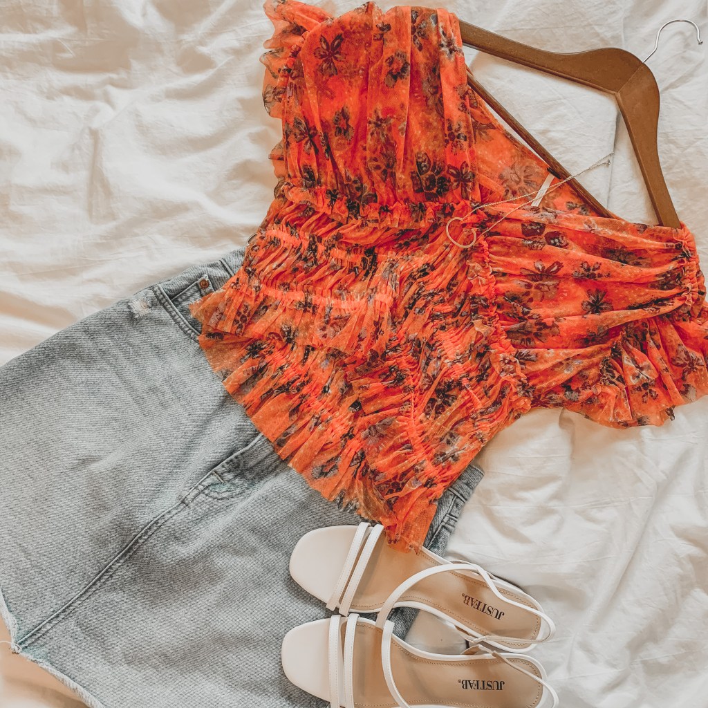 Photo of outfit: Jean skirt and orange blouse 